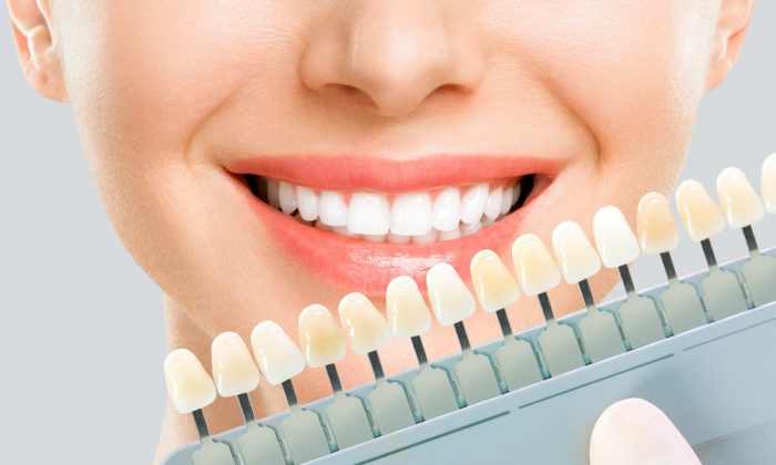 Почему зубы меняют цвет эмали?